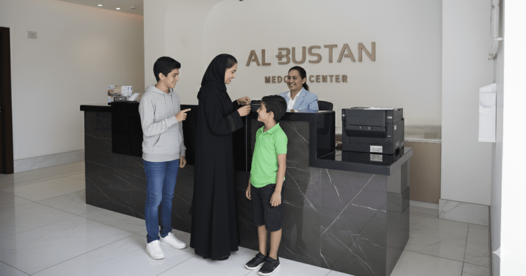 Al Bustan Plus Medical Center, Reception Area with Happy Family